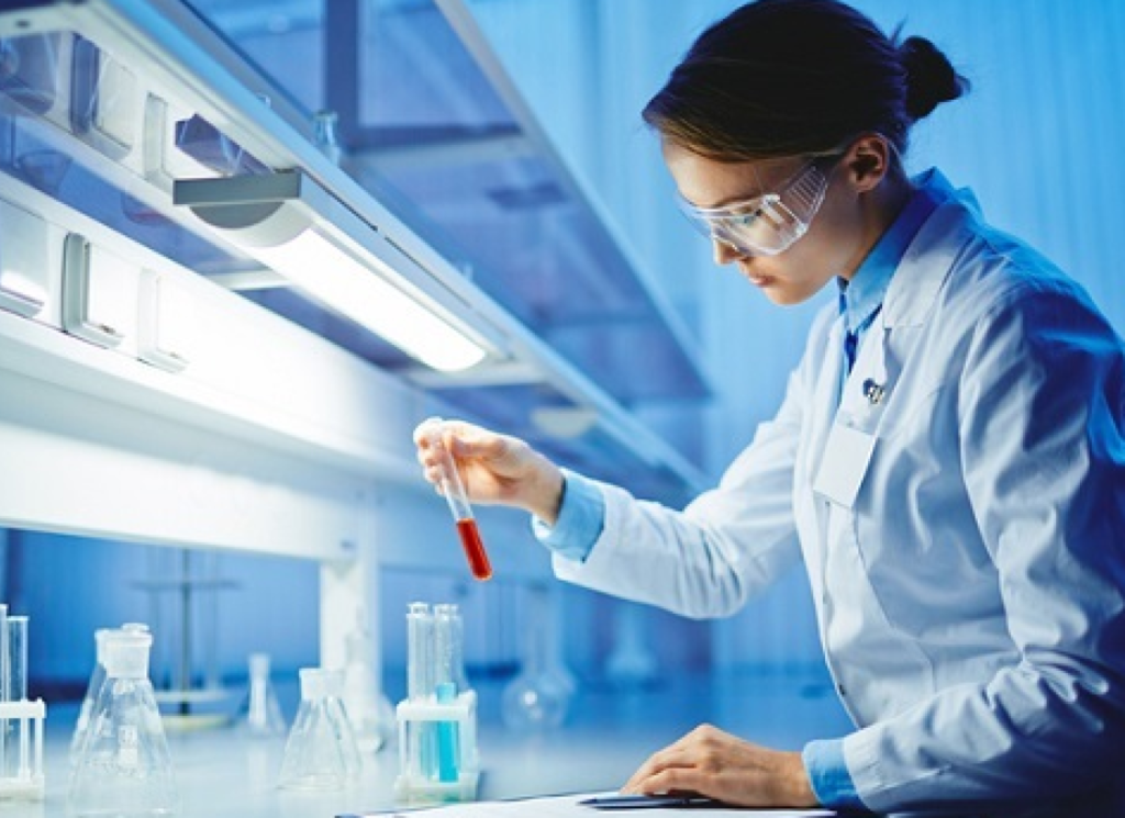 A women testing samples of a Custom formulations for quality assurance.